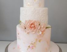 Beautiful tiered stack with embossed sides and handmade flowers