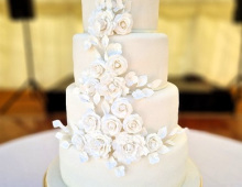 Three-tiered-wedding-cake-white-handmade-flowers